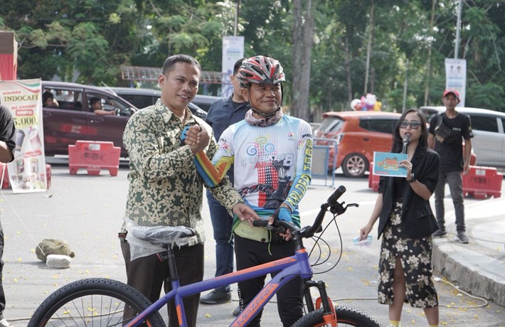 Wesly Diwakili Junaedi Sitanggang Sambut Peserta Geobike Kaldera Toba sekaligus Launching :Jumpa di 